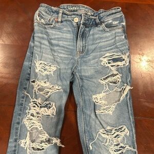 American Eagle ripped mom jeans high rise cross hem